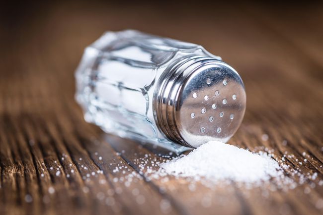 Salt Shaker Spill Wooden Table