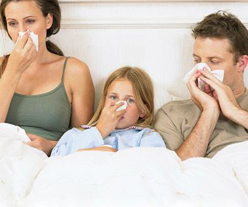 Family sick in bed