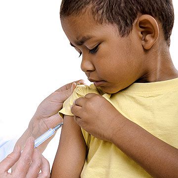 boy getting vaccination