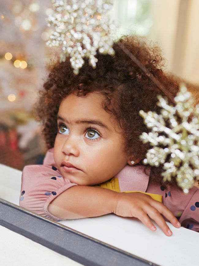 girl looking out the window