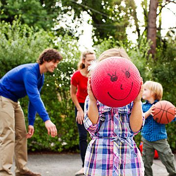 family playing soccer