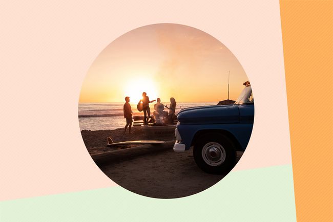 family at the beach during sunset