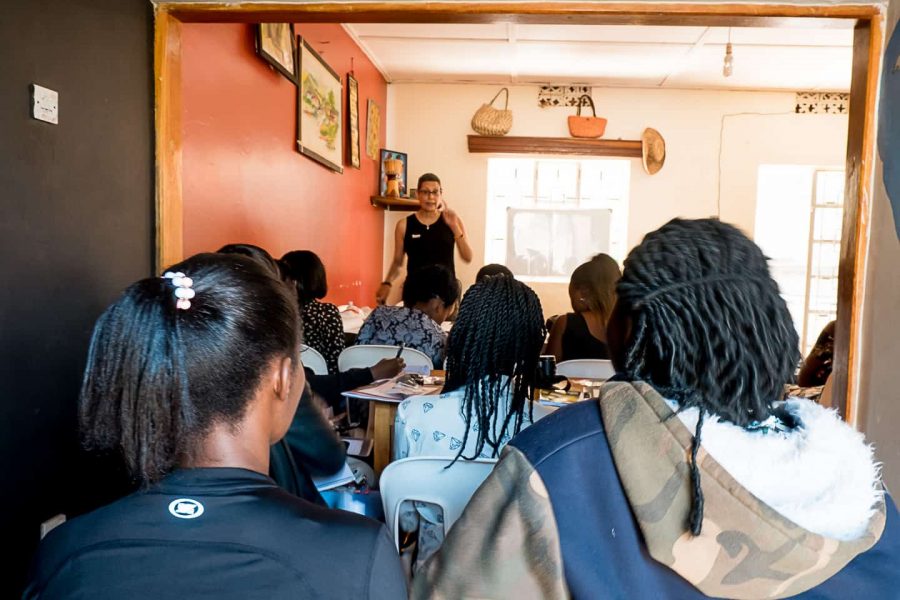 Amina Mohamed teaches a photography class for Cameras for Girls in Uganda