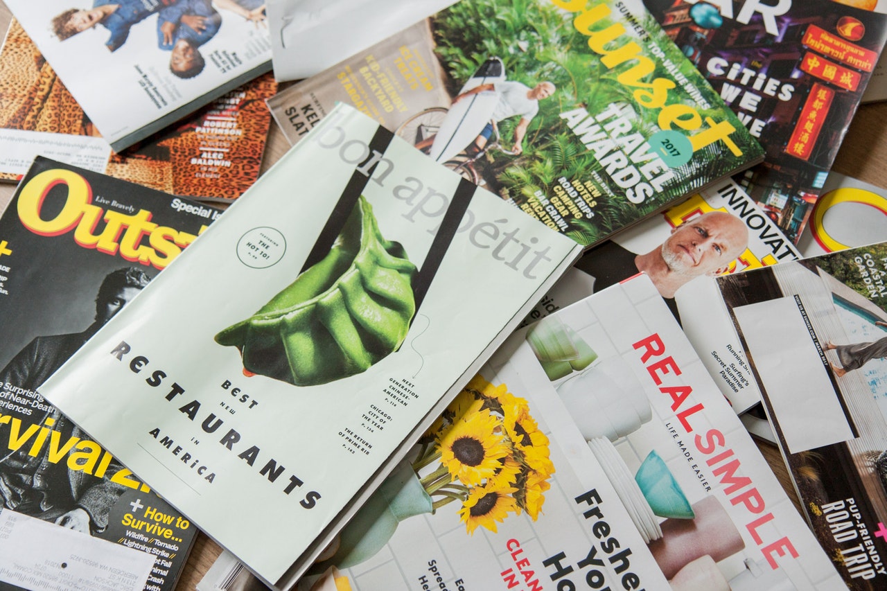 travel magazines on a table