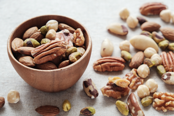 40 Filling Nut Recipes for Every Meal | Nuts offer so many health benefits - they are high in nutrients, a great snack for weight loss, can help lower cholesterol and reduce inflammation, and they are high in fiber to boot! If you're looking for macro-balanced meals to add to your weekly diet plan, make sure to bookmark this post. Whether you prefer sweet or savory dishes, we've curated the best nut recipes for breakfast, lunch, dinner, and dessert - and everything in between!