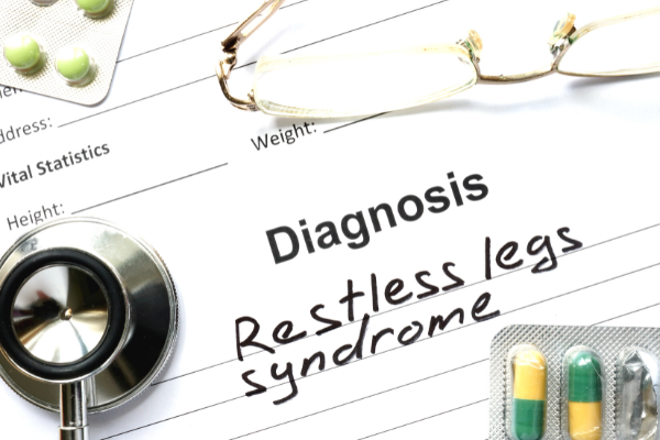 Restless Leg Syndrome 101: 21 Signs, Causes and Treatment Options | What Is 'Restless Leg Syndrome'? What causes it? What are the signs and symptoms? This post answers all of these questions, and includes treatment ideas to help. If you want to know how to get rid of restless leg syndrome, this post includes a mix of natural remedies - stretches, exercises, yoga, essential oils, and everything in between. If restless legs keep you up at night, this post will help you sleep better sooner!