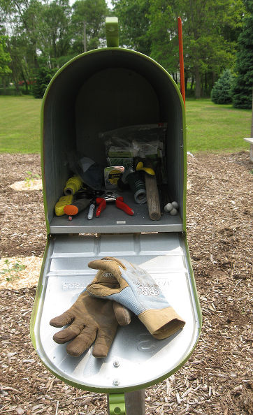 Use Your Garden Mailbox As Your Toolshed