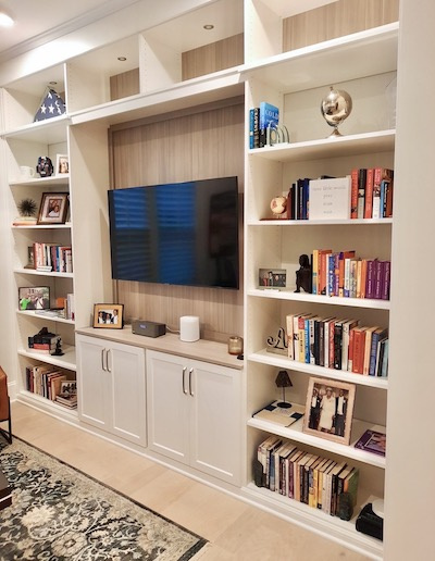 Modern entertainment center with shelves.