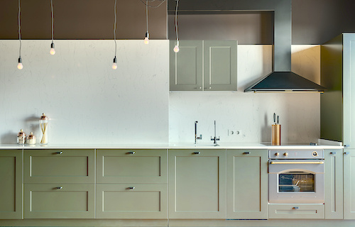 Moss green kitchen cabinets