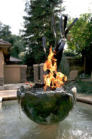 Pool with fountain and fire element.