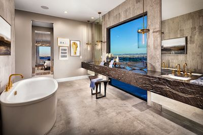 Various bathroom light fixtures and natural lighting with large window